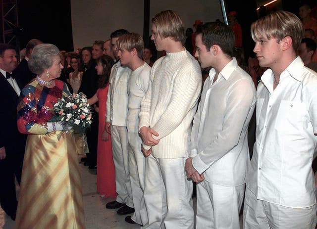 The Queen meets Irish boy band Westlife, backstage after the 1999 Royal Variety Performance 