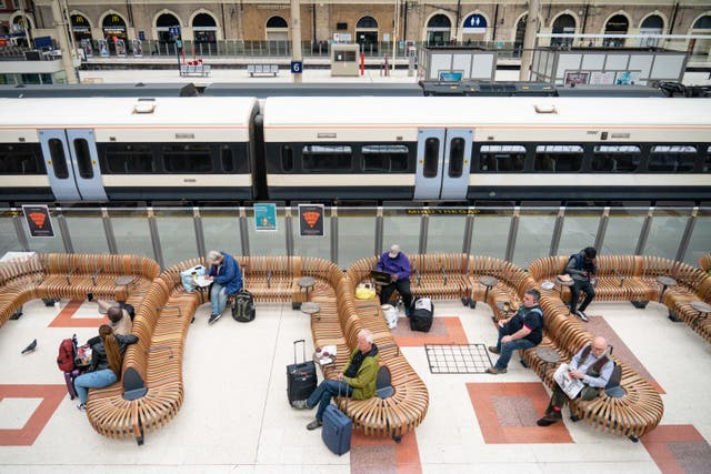 Passengers wait at Victoria station in London, as train services continue to be disrupted following the nationwide strike by members of the Rail, Maritime and Transport union along with London Underground workers in a bitter dispute over pay, jobs and conditions 