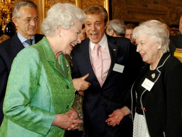 The Queen talks with with Lionel Blair and June Whitfield at the same event 