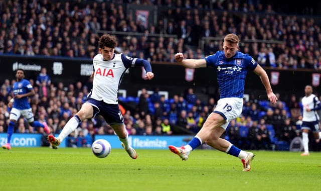 Ipswich’s Liam Delap, right, shoots under pressure from Tottenham's Archie Gray