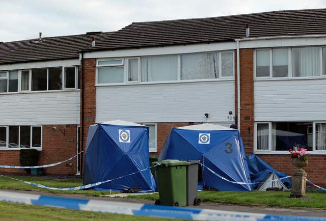 Police tents outside the home in Solihull