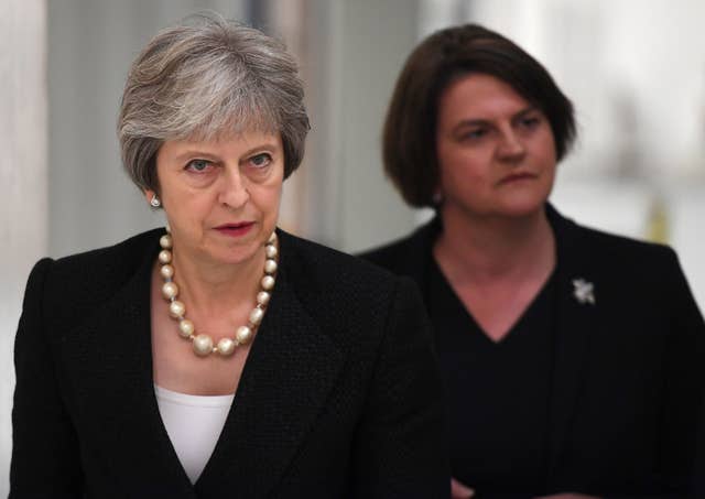 Theresa May depends on the 10 MPs from Arlene Foster's DUP to support her minority administration (Clodagh Kilcoyne/PA)