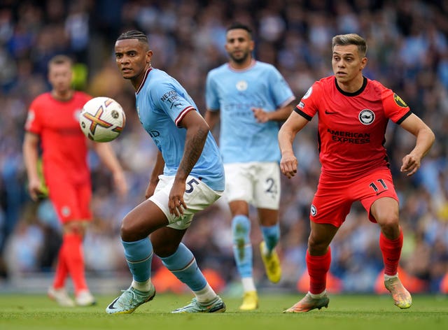 Manuel Akanji (left) and Leandro Trossard (right)