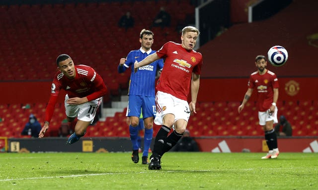 Mason Greenwood, left, scores Manchester United’s winner