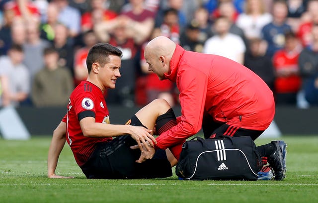 Ander Herrera, left, was taken off against Liverpool as the injuries mounted up for United 