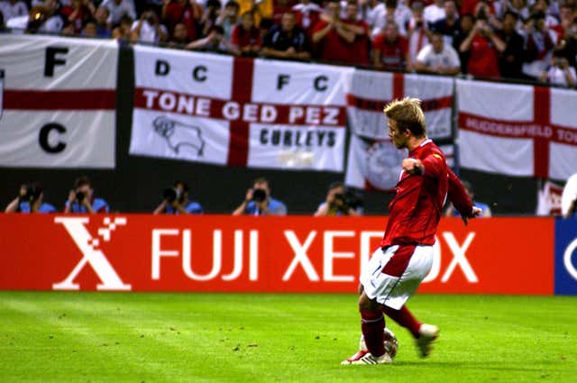 England captain David Beckham scores from the spot against Argentina in 2002