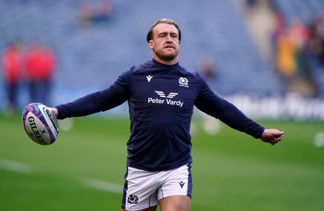 Stuart Hogg warms up