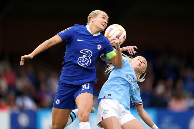 Chelsea’s Magdalena Eriksson, left, and Manchester City’s Chloe Kelly battle for the ball