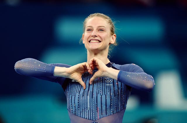 Bryony Page makes a heart symbol