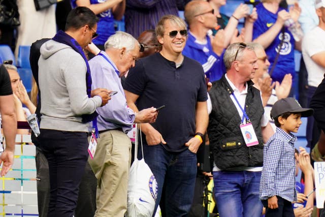 Todd Boehly, centre, watched Chelsea beat Watford on Sunday