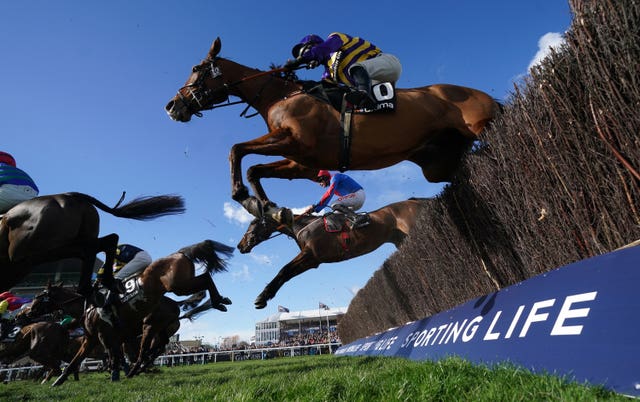 Corach Rambler ridden by Derek Fox on their way to winning the Ultima Handicap Chase on day one of the Cheltenham Festival 