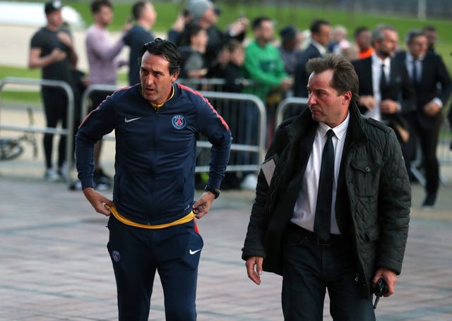 Emery (left) ended a two-year spell as coach of Paris Saint Germain before being offered the Arsenal job.