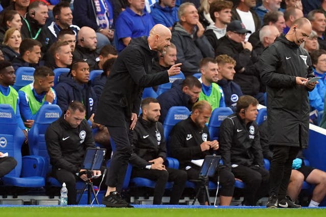 Erik ten Hag watches on at the Amex