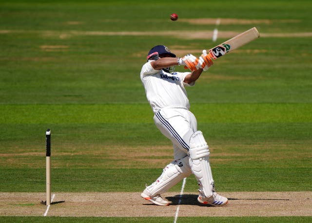 India’s Rishabh Pant hooks a six to reach his 50