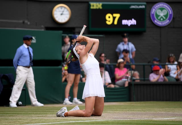 Simona Halep collapses to her knees as she clinches the Wimbledon title