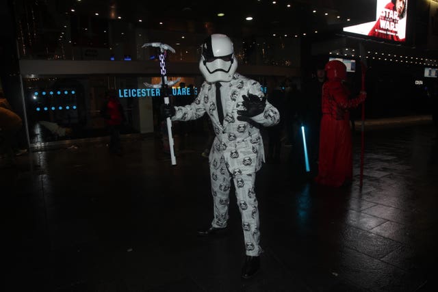 Matthew Johnston from Tottenham, dressed as a First Order stormtrooper executioner, arrives for a screening (Yui Mok/PA)