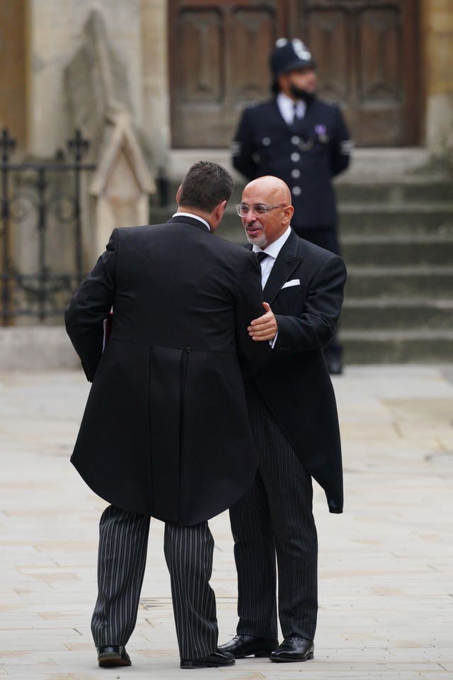 Chancellor of the Duchy of Lancaster and equalities minister Nadhim Zahawi, right, arriving for the Queen's funeral