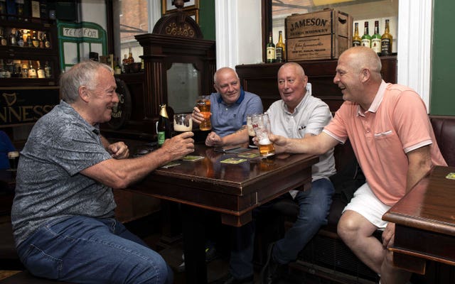 Drinkers celebrate in Slattery's Bar, Dublin