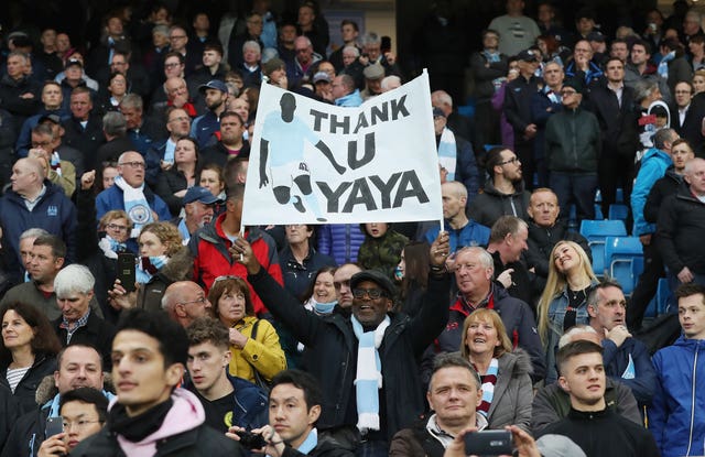 A fan in the stands thanks Yaya Toure during the Premier League match at the Etihad Stadium (Martin Rickett/PA)
