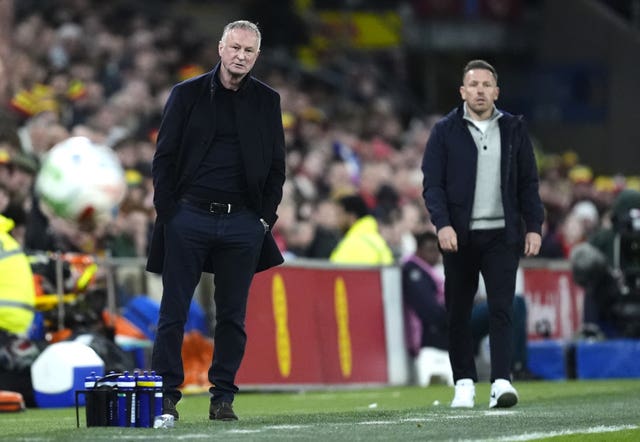 Northern Ireland head coach Michael O&rsquo;Neill, left, with Wales boss Craig Bellamy in the background