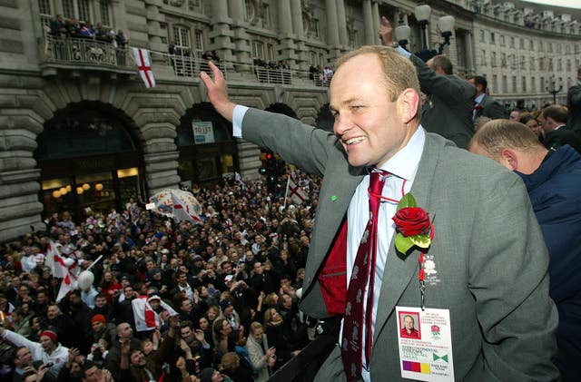 Andy Robinson waves to the crowds during England's 2003 victory parade