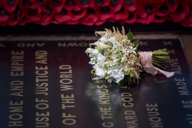 The Duchess of Sussex followed royal tradition and left her wedding bouquet on the Unknown Warrior's tomb