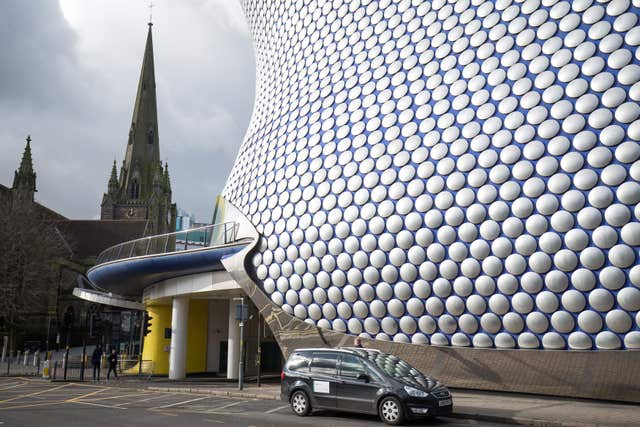 An Uber driver waits for a fare outside the Bullring shopping centre in Birmingham (Aaron Chown/PA)