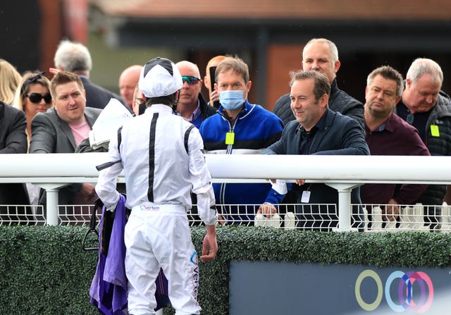 Nick Bradley speaks to a jockey at Beverley