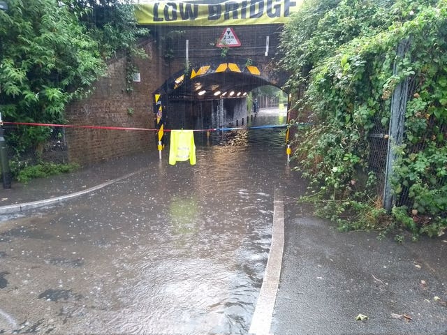 A flooded road in south London after heavy rainfall 