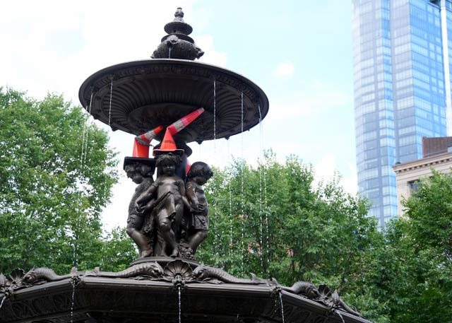 Traffic cones in a water fountain during the World Cup