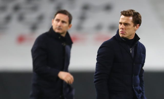 Former Fulham manager Scott Parker (right) and ex-Chelsea boss Frank Lampard have both been linked to the Burnley post