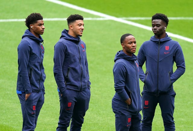 England duo Marcus Rashford, left, and Raheem Sterling, second right, have each been made MBEs