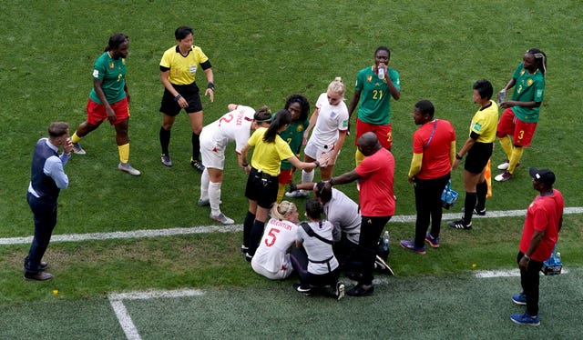 England’s Steph Houghton is treated after being fouled late on