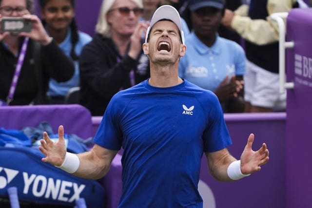 Andy Murray roars with delight as he looks to the skies following his victory at Queen's