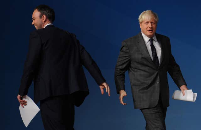 Gavin Barwell (left) and Boris Johnson (right) at the Conservative Party Conference. (Stefan Rousseau/PA)