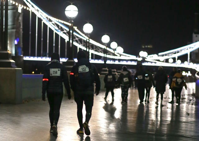 Walkers participating in the first Lost Hours Walk (Hannah Goodwin/Calm/PA)