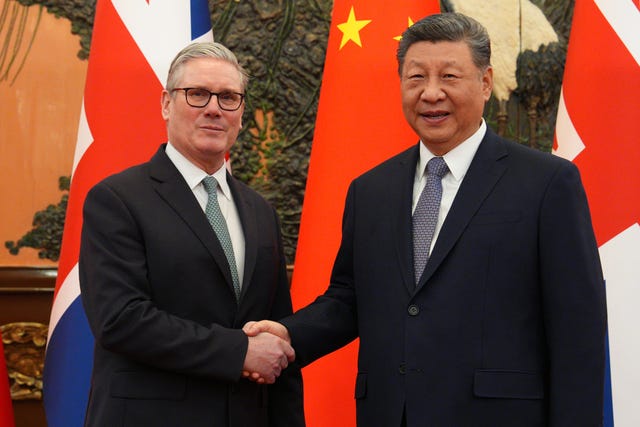 Prime Minister Sir Keir Starmer shaking hands with Chinese President Xi Jinping