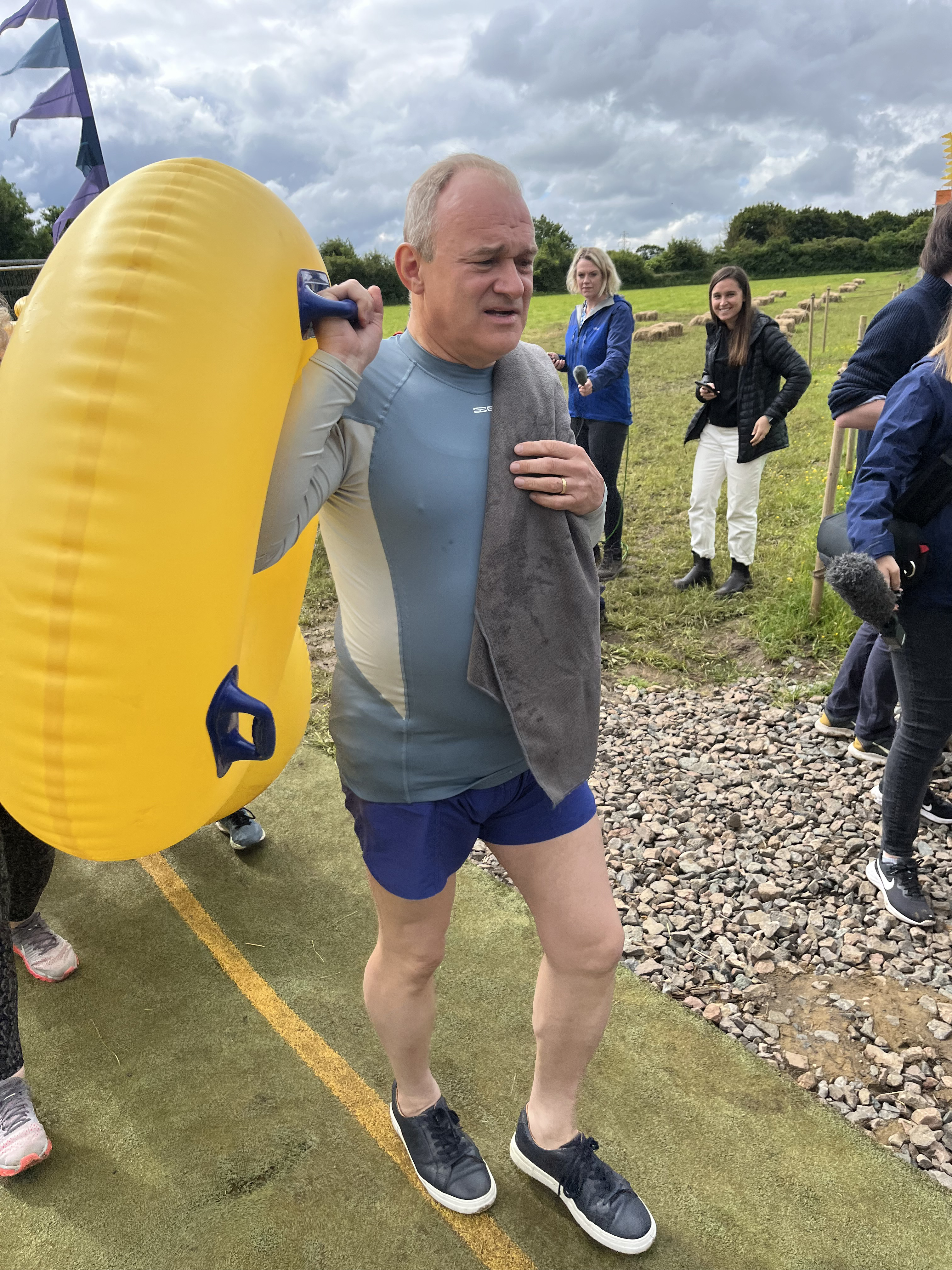 Sir Ed Davey Defends Election Stunts As He Races Down Water Slide In ...