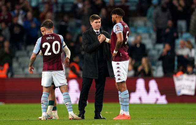 Tyrone Mings, right, felt Aston Villa could be proud of their display against Liverpool