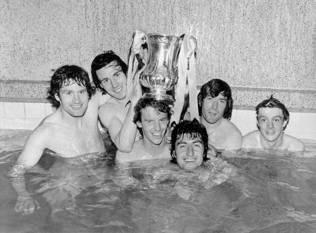 Jennings, second from right, celebrates winning the 1979 FA Cup with his Arsenal team-mates 