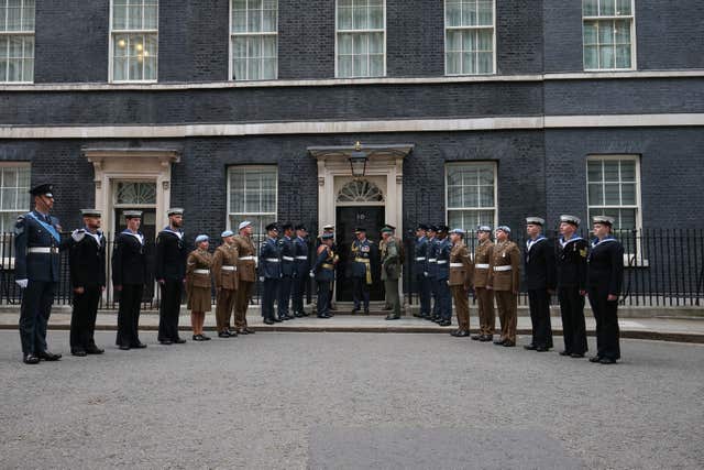 Junior ranks from the RAF, Fleet Air Arm, and Army Air Corps, wait to greet personnel from the Army, Navy and RAF, at a RAF100 reception recognising the contribution the Army and Navy played in the formation of the RAF (Jonathan Brady/PA)