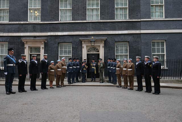 Junior ranks from the RAF, Fleet Air Arm, and Army Air Corps, wait to greet personnel from the Army, Navy and RAF, at a RAF100 reception recognising the contribution the Army and Navy played in the formation of the RAF (Jonathan Brady/PA)