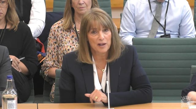 Dame Carolyn McCall speaking while seated at a table in Commons committee room