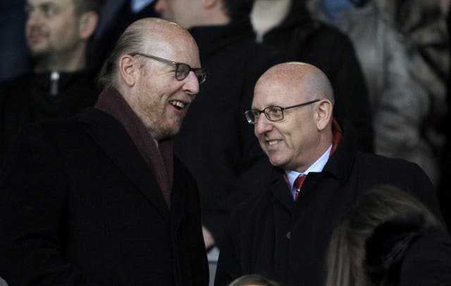 Manchester United co-chairman Joel Glazer pictured right with brother Avram, was involved in planning for the Super League