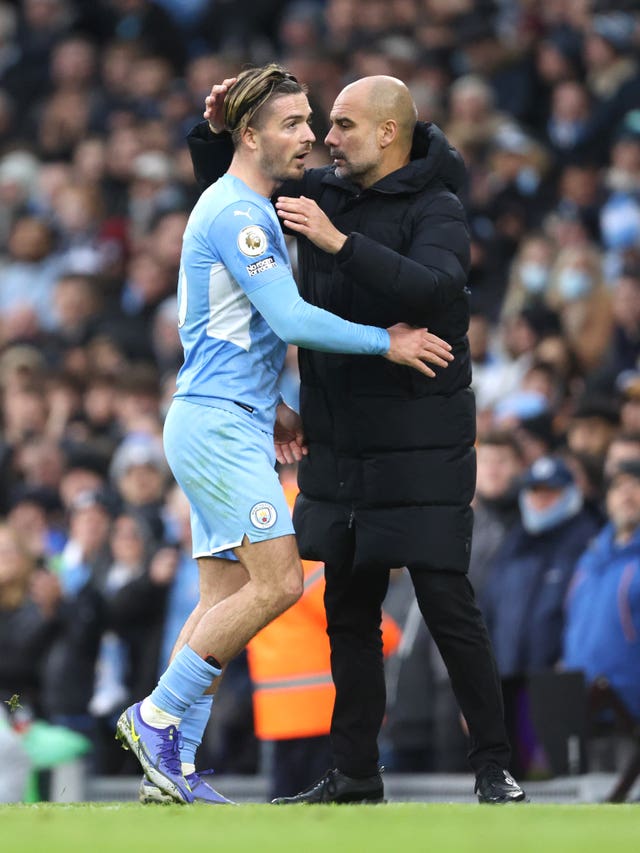 Guardiola (right) has no concerns about Grealish's performances