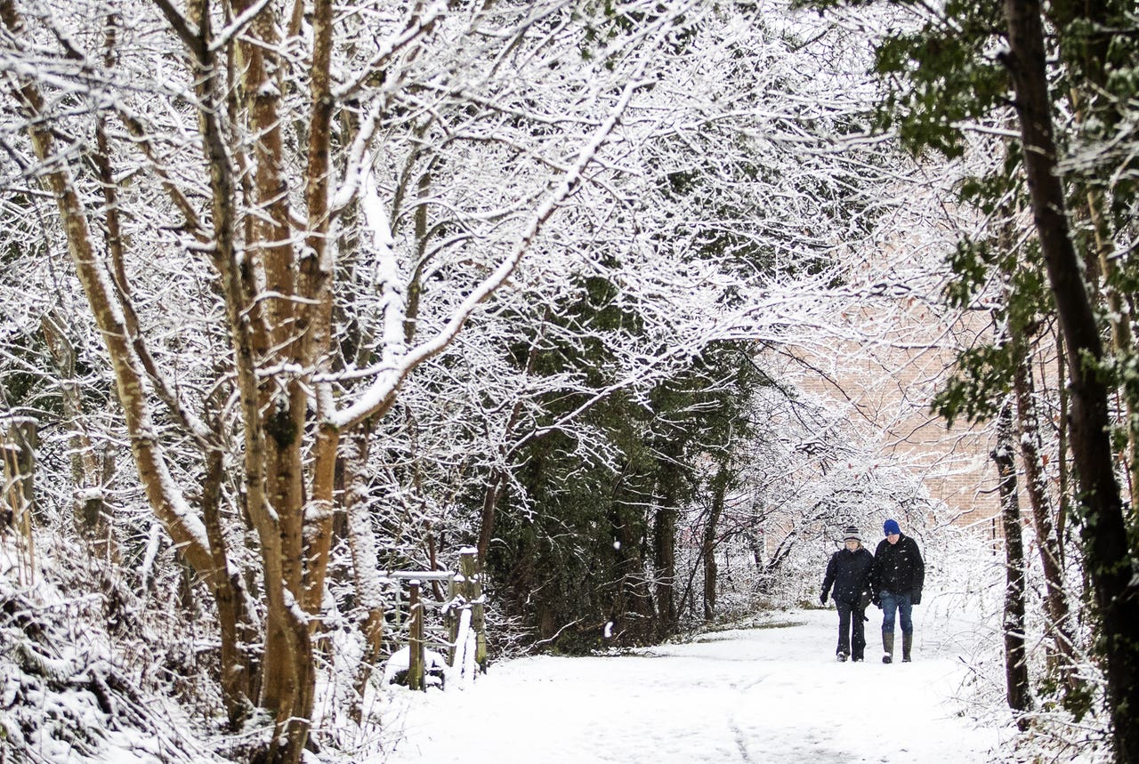 In Pictures: Wintry conditions as snow and freezing rain batters parts ...