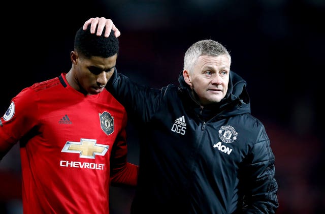 Manchester United manager Ole Gunnar Solskjaer with Marcus Rashford