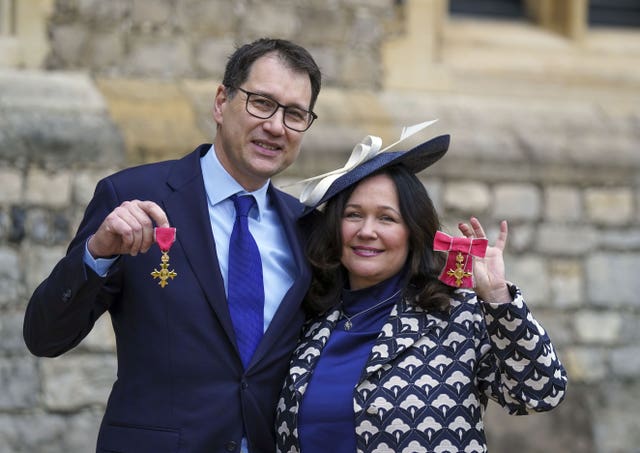 Tanya Ednan-Laperouse and Nadim Ednan-Laperouse after receiving OBEs from the Duke of Cambridge during an investiture ceremony at Windsor Castle