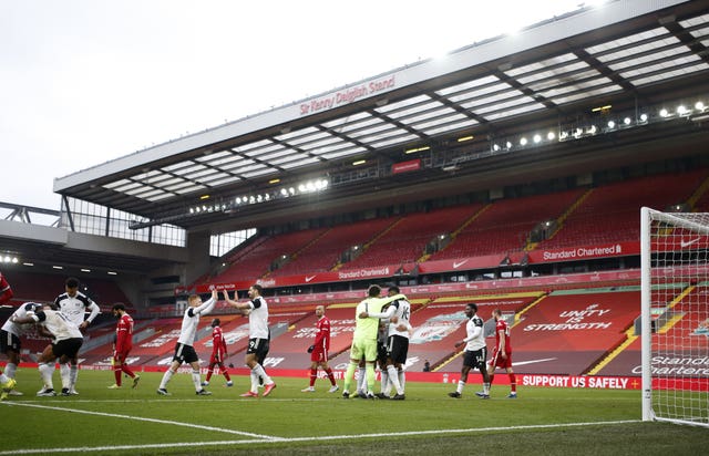 Fulham celebrate victory at Anfield last March