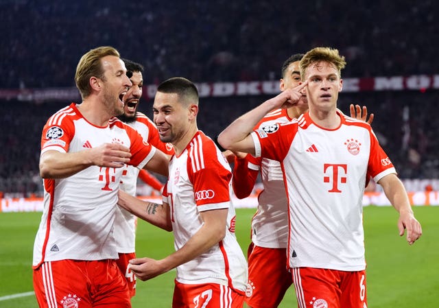 Bayern Munich’s Joshua Kimmich (right) celebrates with team-mates after scoring the winning goal for Bayern Munich